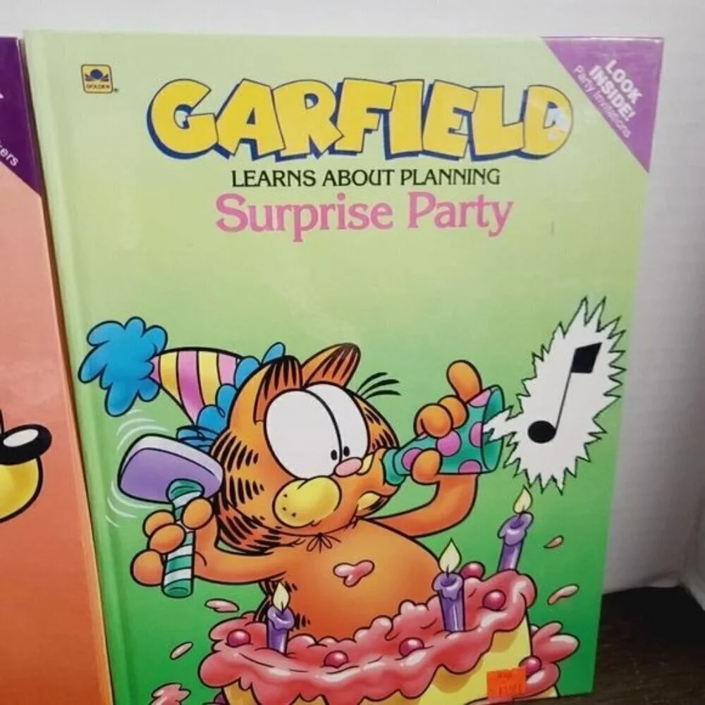 Lot of 2 Vintage Garfield Cartoon Books Endangered Odie Surprise Party